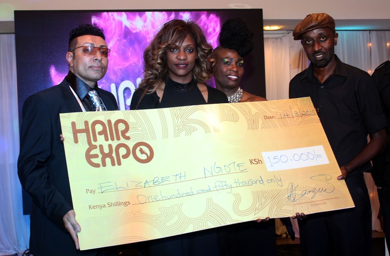 From left: Judge Farouk Jannedy, Elizabeth Ngote, winner of the weaving category as well as the overall winner holding the dummy cheque (won an all expenses paid trip to the 20th Edition of Beautyworld Middle East in Dubai), judges Mercy Ollows and Ronnie Maingi