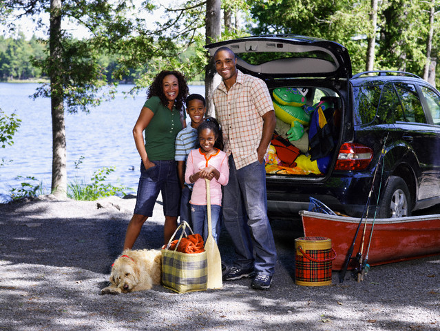 Family at Lake for Vacation --- Image by © Larry Williams/Corbis