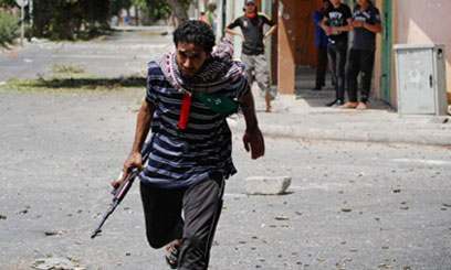 LIBYAN-REBEL-RUNS