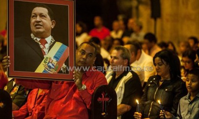 People attend a mass for the health of Venezuelan President Hugo Chavez in Havana/AFP