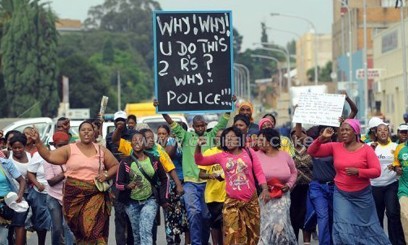 Protesters march outside the Benoni court/AFP