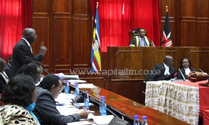 Peter Mathuki and Saoli Ole Nkanai argue that the cost of labour mobility will reduce if work permit fees are removed/FILE