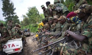 Jeeps full of M23 rebels drive towards the town of Sake in eastern DR Congo on November 30, 2012/AFP