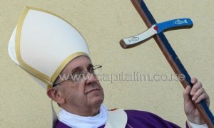 Pope Francis leads a mass during his visit to the Italian island of Lampedusa on July 8, 2013/AFP