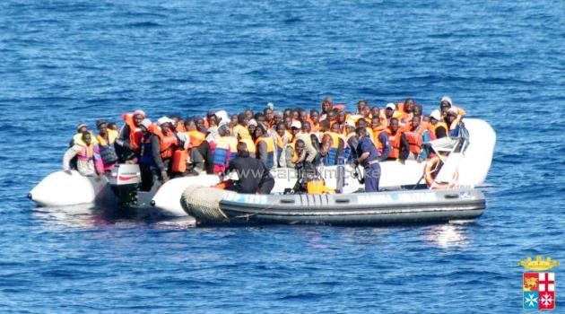 A handout photo taken on February 16, 2014 by the Italian Navy shows immigrants being rescued near the Italian island of Lampedusa/AFP
