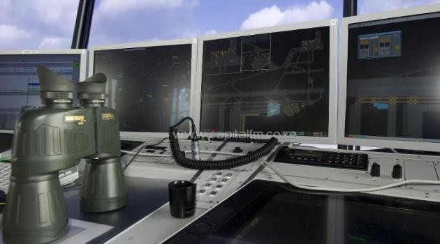 A Chinese aircraft was forced to delay its landing after two air traffic controllers nodded off, reports say/AFP