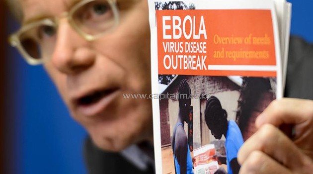 World Health Organization emergency chief Bruce Aylward holds a report on the Ebola virus during a press conference on September 16, 2014 at the UN offices in Geneva/AFP