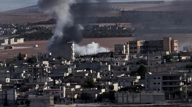 Smoke rises after an airstrike on Syria's Kobane, October 9, 2014. A US-Turkish team will meet to discuss the fight against IS/AFP