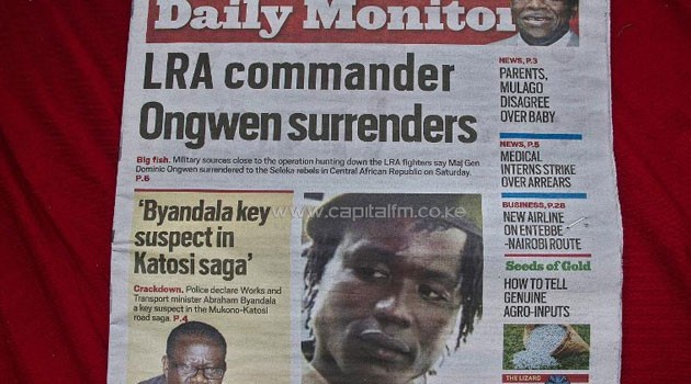 A Ugandan daily dated January 7, 2015 carries a picture of former LRA second-in-command Dominic Ongwen, now in the custody of US special forces based in Central Africa Republic © AFP
