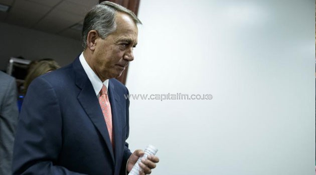 Speaker of the House John Boehner leaves a meeting with House Republicans on Capitol Hill January 13, 2015 in Washington, DC/AFP
