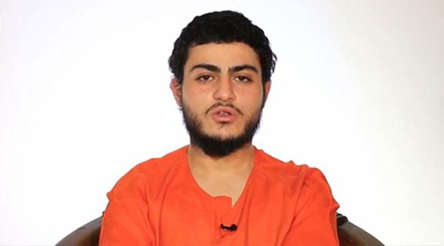 An image grab taken March 10, 2015 from a video reportedly released by the Islamic State group through Al-Furqan Media shows a youth identifying himself as Mohammed Said Ismail Musallam and addressing the camera in Arabic at an undisclosed location/AFP