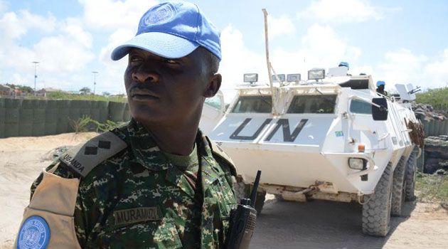 Members of Uganda UN guard unit stand guard at the United Nations' compound of Halane, on May,18, 2014 in Mogadishu/AFP