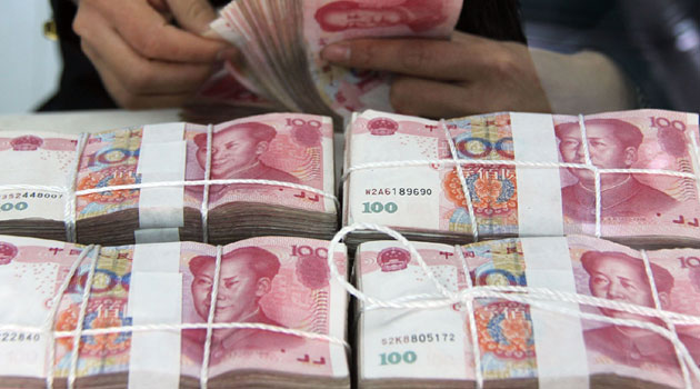 But when she checked her account earlier this month it held only 124 yuan, the report on Tuesday stated/FILE