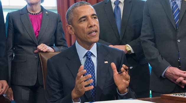 US President Barack Obama, shown in a file picture, signed into law landmark legislation ending the government's bulk telephone data dragnet/AFP