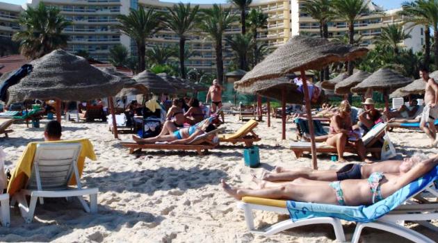 Tourists are seen relaxing on the beach in 2013 in the Tunisian tourist resort of Sousse, targeted Friday in a deadly shooting/AFP  