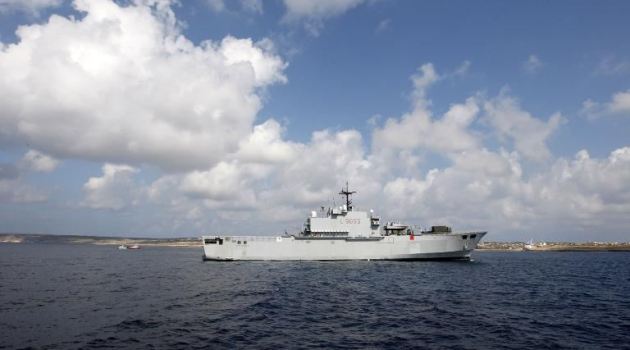 An Italian Navy ship rescued migrants as they were heading to the island of Lampedusa/AFP 