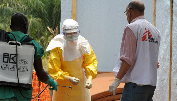 Doctors wearing ebola protective garments/FILE