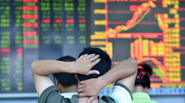 China's stock market surge started in late 2014 despite the economy experiencing its slowest growth in 24 years/XINHUA