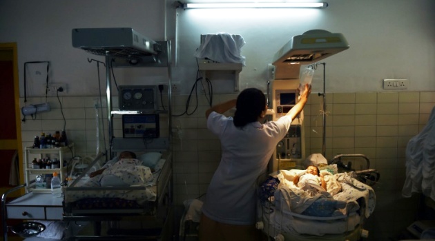 A nurse takes care of newborn children at Delhi adoption agency Palna, but the facility's assitant director said fewer abandoned babies had been received lately amid fears some are being handed to criminals/AFP  