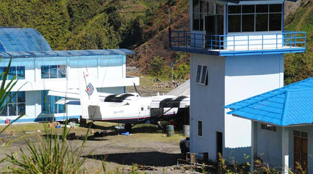 A Trigana Air plane is seen at an airport in Mulia, in Indonesia's restive Papua region, in April 2012 after pilots lost control when gunmen fired on the plane as it landed/AFP