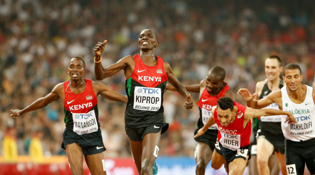 Asbel Kiprop leads compatriots past the line to clinch the 1,500m gold medal. Photo/ AFP