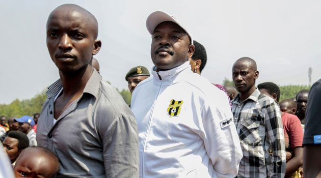 Burundi's President Pierre Nkurunziza at a polling station during the parliamentary and local elections on June 29, 2015/AFP