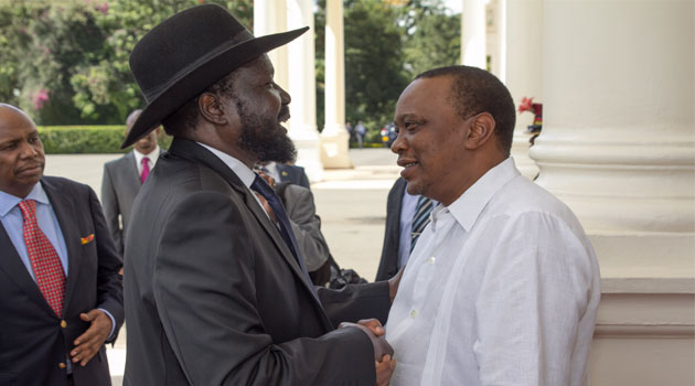 President Kenyatta shakes hands with President Kiir during a previous visit by the latter in Nairobi. Photo/ FILE