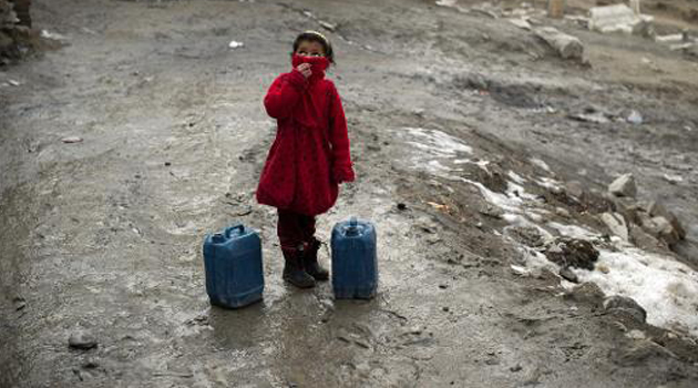 A child carrying water/FILE