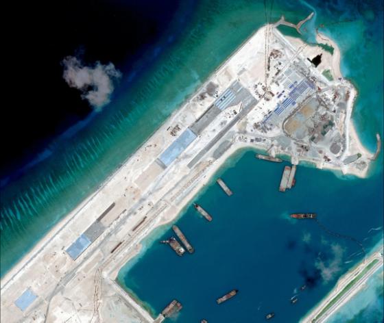 Photo taken on April 2, 2015 by satellite imagery provider DigitalGlobe shows an image of what is claimed to be an under-construction airstrip at Fiery Cross Reef in the Spratly Islands in the disputed South China Sea/AFP