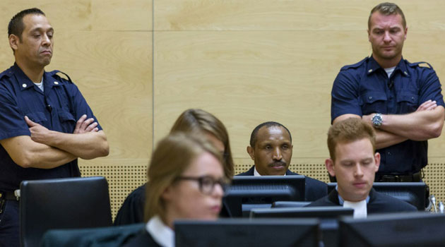 Congolese warlord Bosco Ntaganda sits in the courtroom of the International Criminal Court (ICC) in The Hague during the first day of his trial on September 2, 2015/AFP