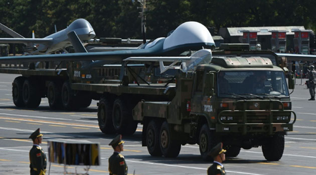 Military vehicles carrying unmanned aerial vehicles participate in a military parade at Tiananmen Square in Beijing, on September 3, 2015, to mark the 70th anniversary of victory over Japan and the end of World War II © AFP