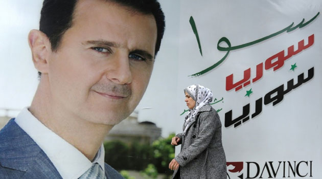 A poster of Bashar al Assad/FILE