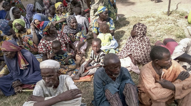 A picture released by the Nigerian army on October 28, 2015 shows some of the 338 people held by Boko Horom after they were rescued during an army operation and evacuated to Mubi, northeast Nigeria  © Nigerian Army/AFP