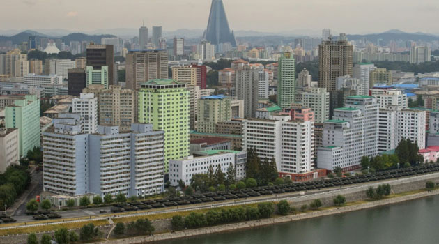 Military vehicles line up on a road in Pyongyang on October 10, 2015, ahead of a lavish celebration marking the 70th anniversary of its ruling Workers' Party/AFP