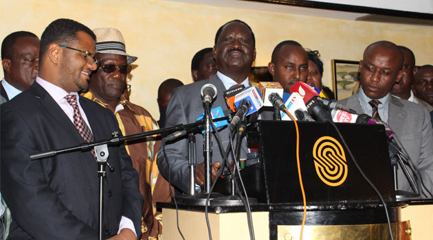 Odinga flanked by CORD legislators at a press conference in Nairobi.