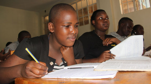 Young girls study for exams at a makeshift centre in Kibera, Nairobi.