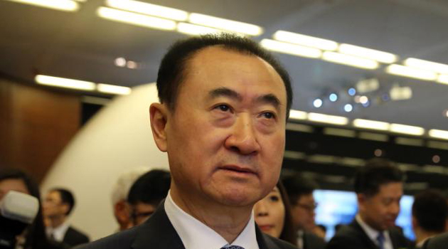 Wang Jianlin (C), CEO of Dalian Wanda Commercial Properties Co./AFP