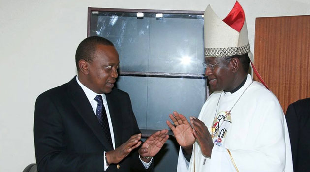 Catholic Bishop Alfred Rotich with President Uhuru Kenyatta on Sunday. 