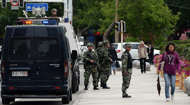 Paramilitary police patrol in China's western Xinjiang region © AFP 