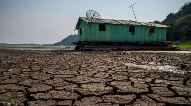 The UN's climate science panel has warned of an average temperature rise of "four, five, six degrees, if we do not act extremely quickly," he said/AFP