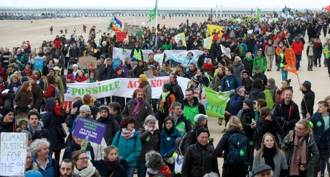 More than 10,000 activists marched near Ostende in Belgium/AFP