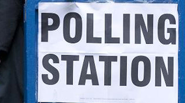 A polling station sign post/FILE