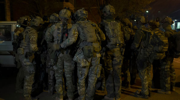 French soldiers form up near the Splendid hotel in the Burkina Faso capital Ouagadougou/AFP