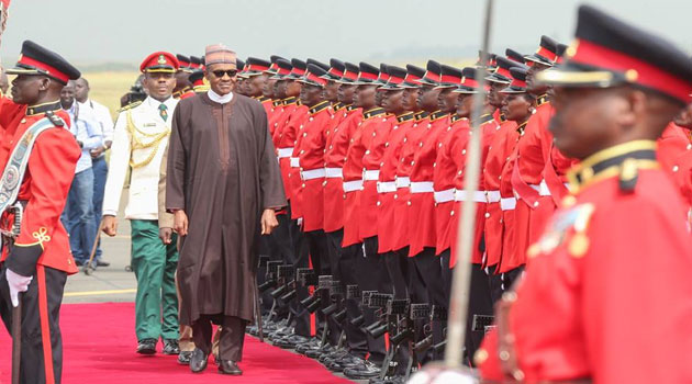 Nigeria's president Buhari inspects a guard of honour in Eldoret. Photo/ PSCU