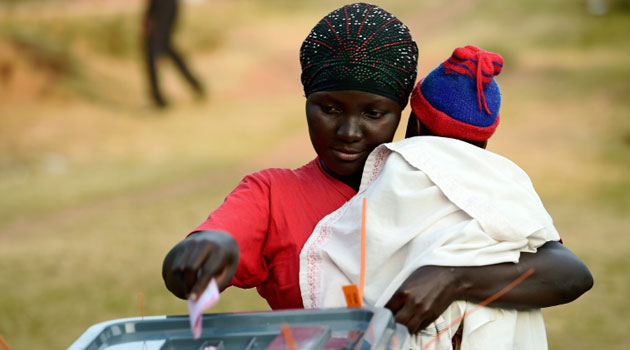 A Ugandan woman voting/FILE