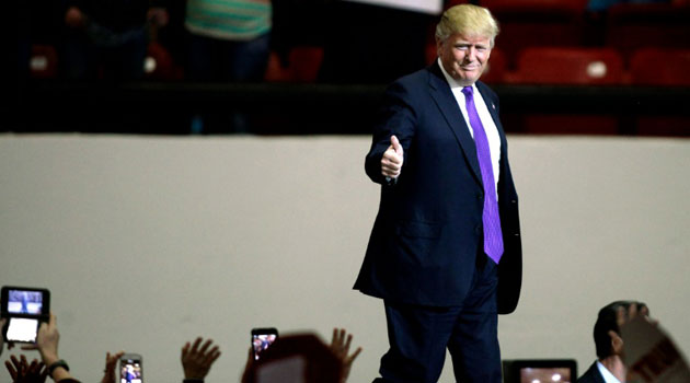 Republican presidential candidate Donald Trump arrives to speak in Las Vegas, Nevada, February 22, 2016/AFP