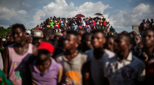 Supporters of Guy Brice Parfait Kolelas, gather at the party headquarters in Brazzaville on March 23, 2016/AFP