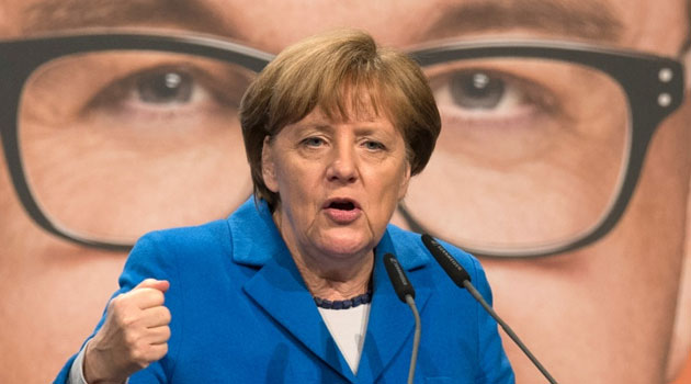 German Chancellor Angela Merkel has been under intense pressure to change course and shut Germany's doors after 1.1 million refugees arrived in Europe's biggest economy last year alone/AFP