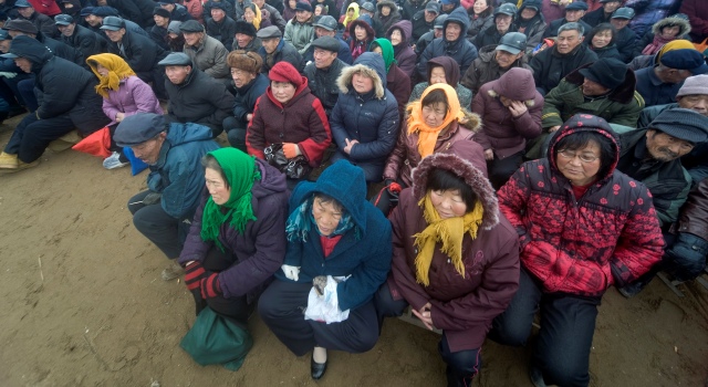 Chinese rural eldery people gather to watch a local opera. Reports state that the Chinese population of people aged 60 or above is over 14 per cent of the total population.EPA/WU HONG