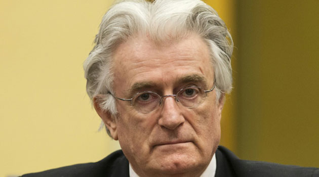 Karadzic, sporting his familiar bouffant hairstyle, will face judges at the International Criminal Tribunal for the former Yugoslavia (ICTY) at 1300 GMT for the historic ruling/AFP